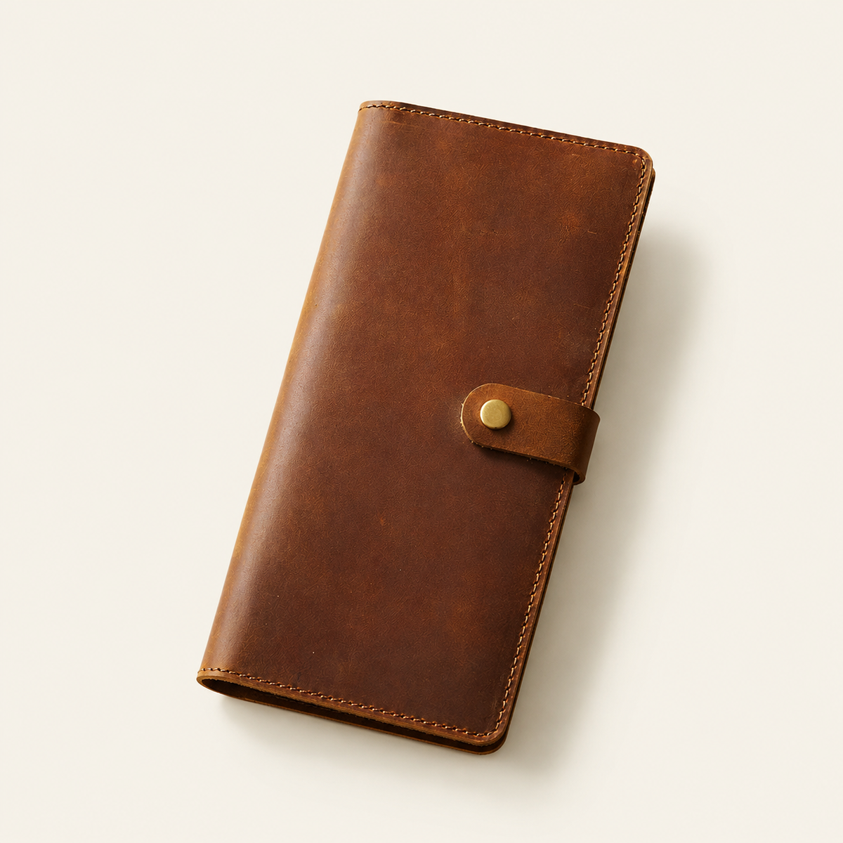 Longfold wallet in Brown, closed front view
